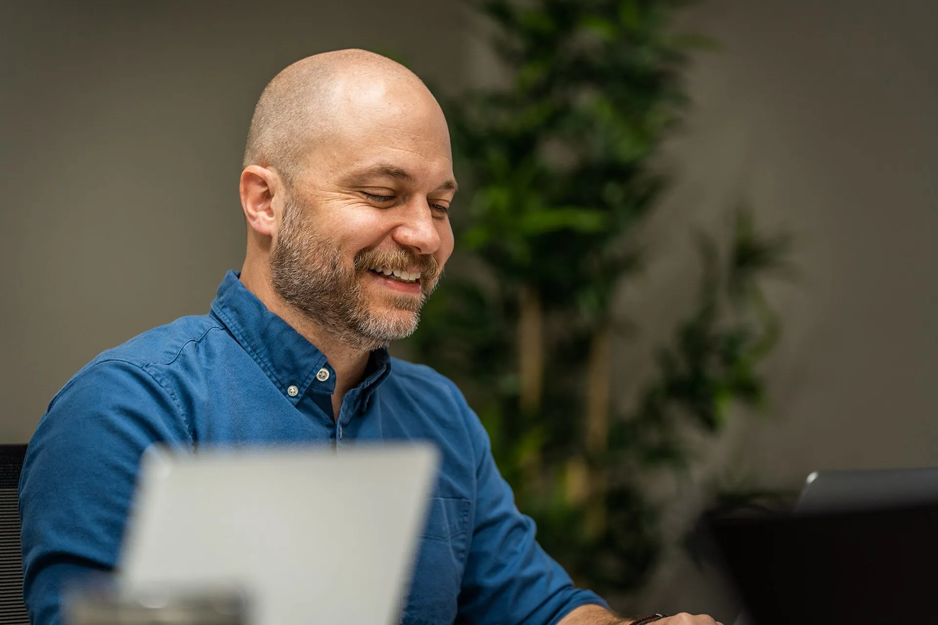 A member of the Story Marketing team working in the office